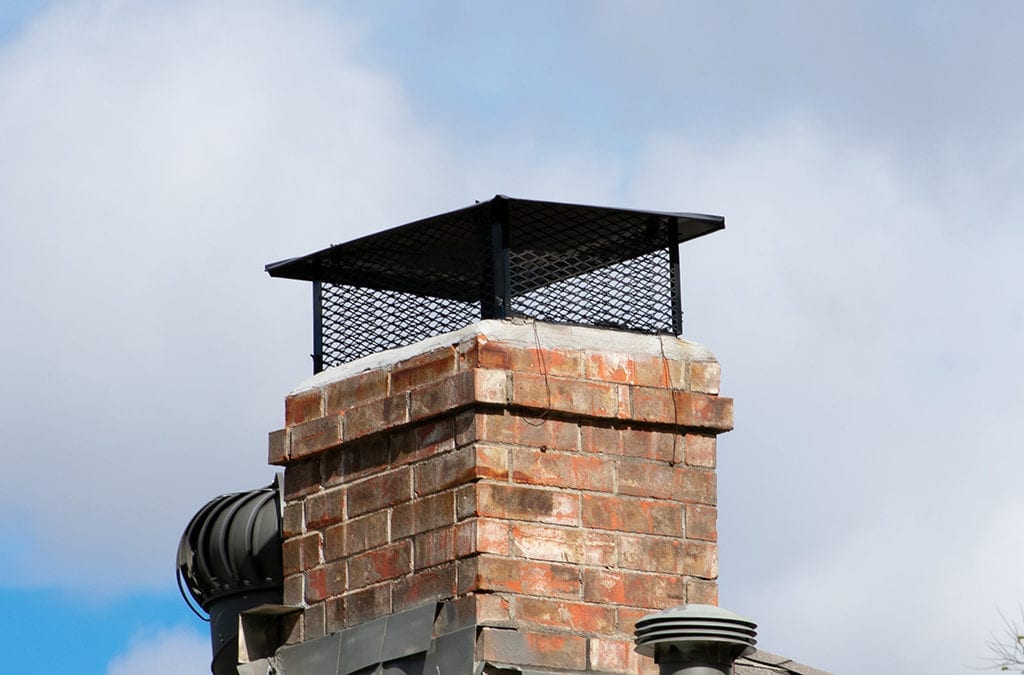 Do chimney caps keep water out?