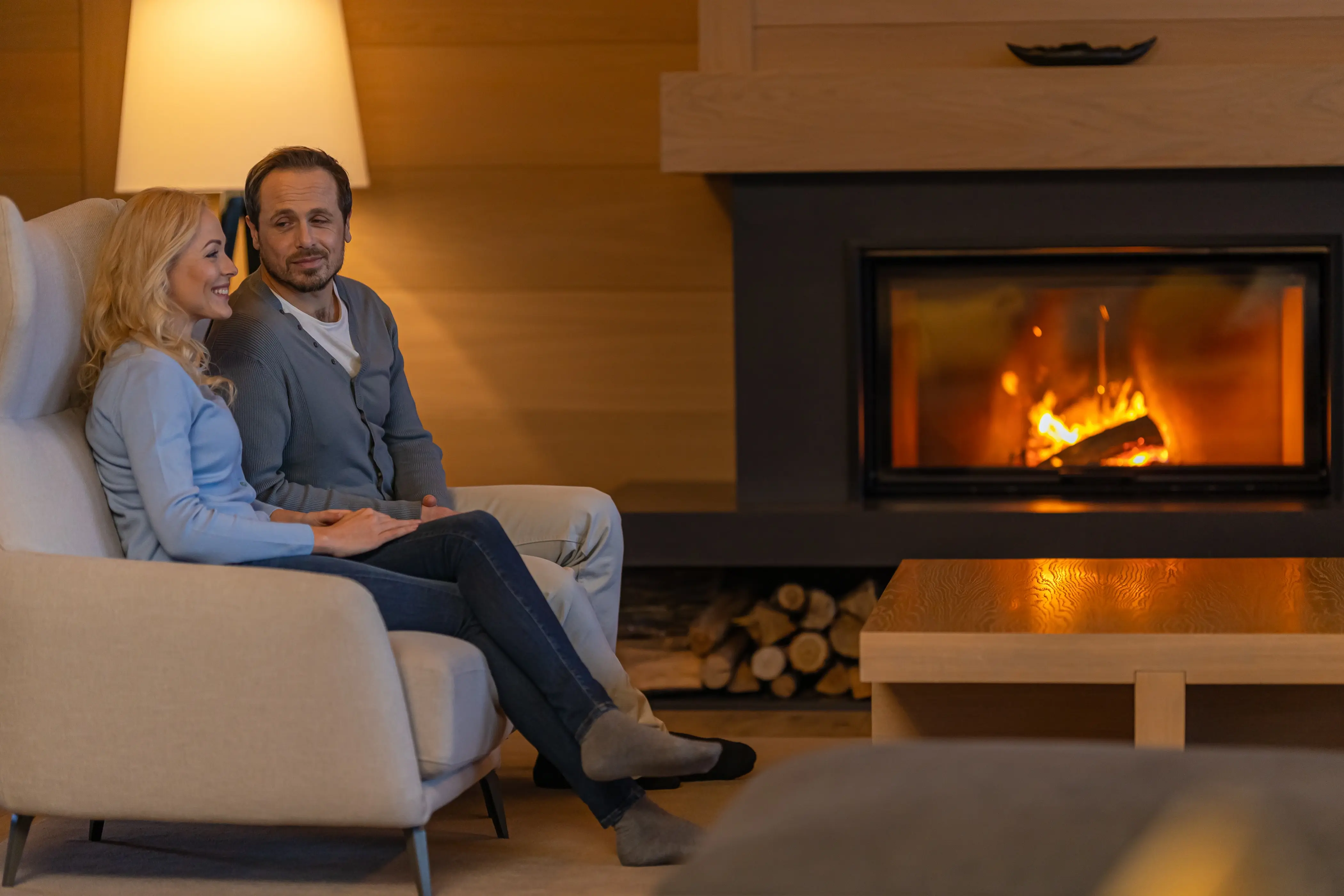 couple with modern fireplace design