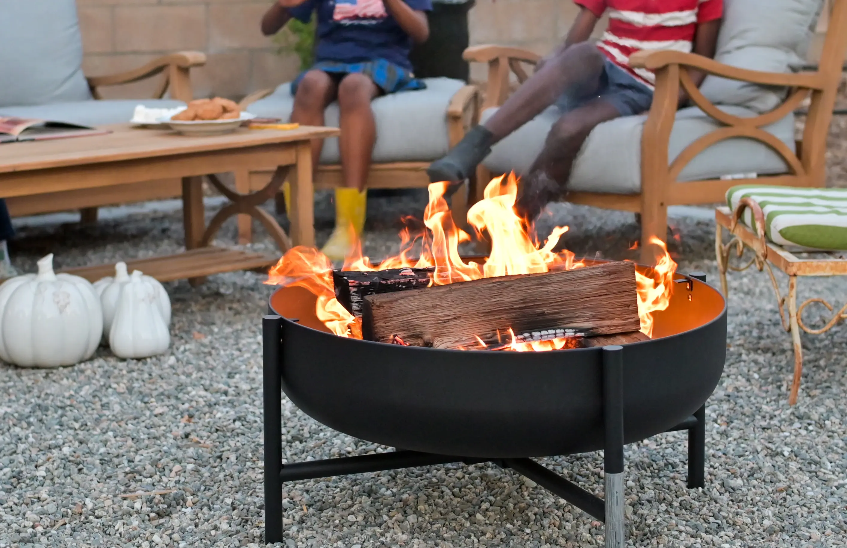 two women in outdoor Fireplaces
